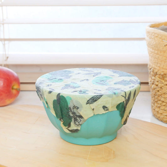 vegan food wraps made with organic cotton closing a food container in the kitchen