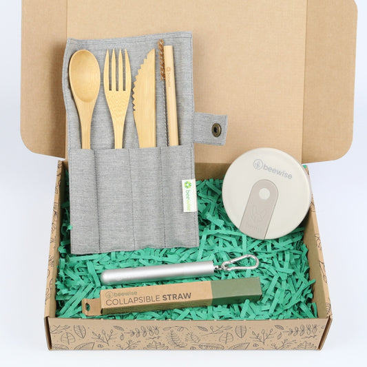 eco gift box with sustainable products with reusable cutlery set, silicone reusable cup and collapsible straw