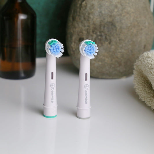 Recycled Electric Toothbrush Head Oral B on the sink of a bathroom