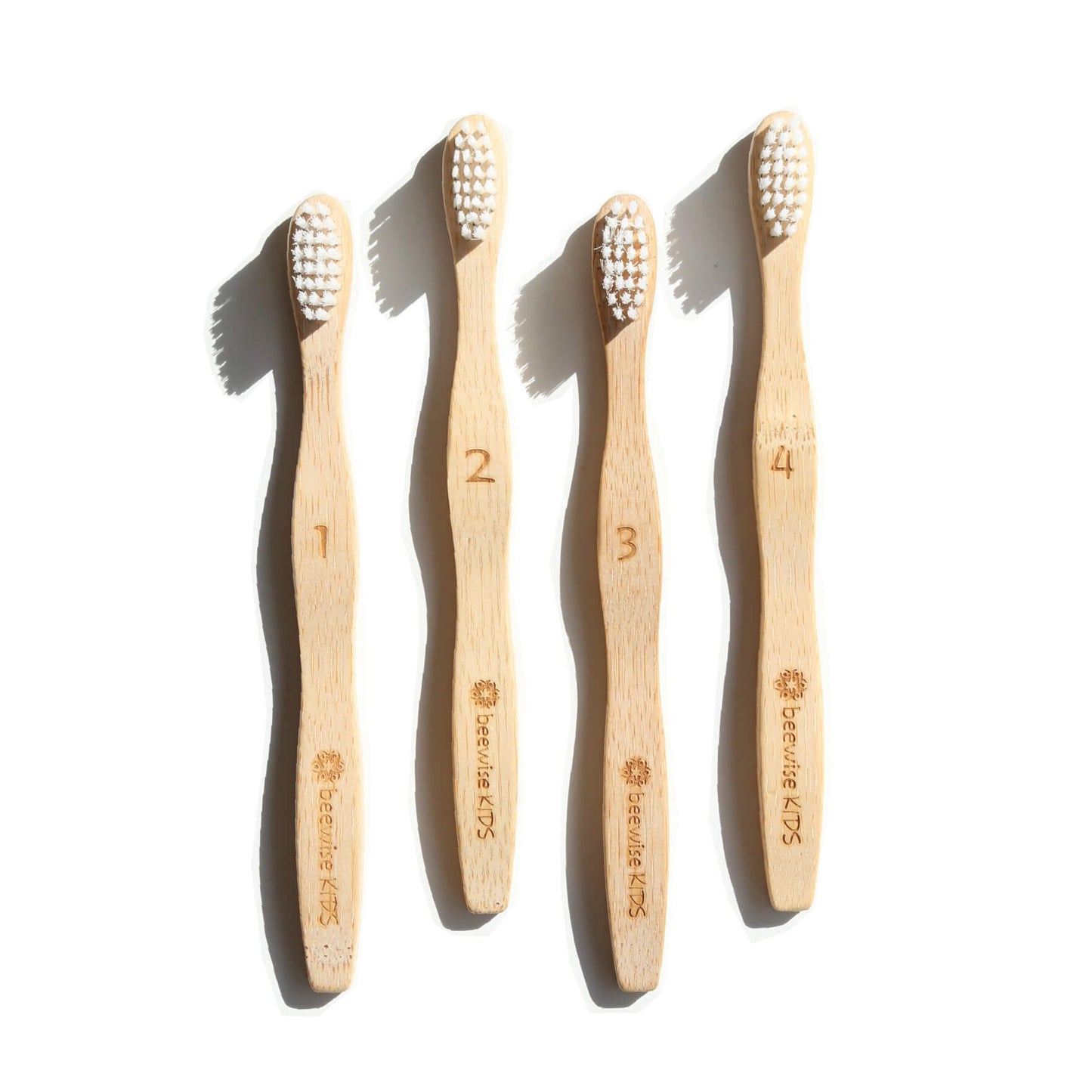 bamboo toothbrush for kids with numbers from 1 to 4 on the handle from beewise amsterdam