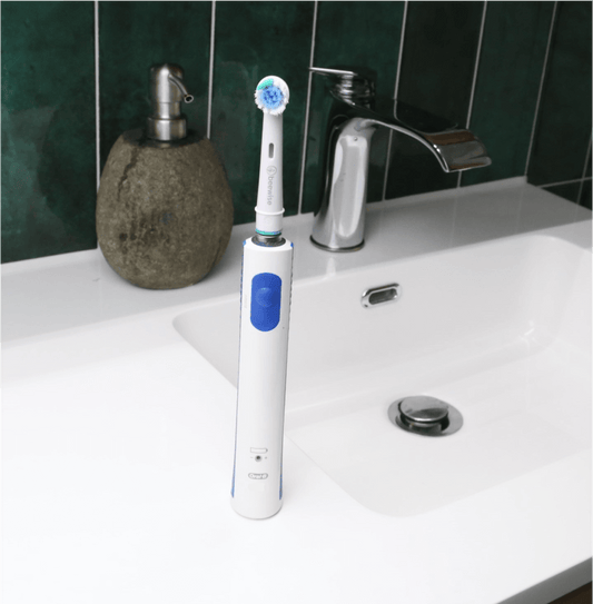 Recycled Electric Toothbrush Heads for Oral-B® – Eco-Friendly Replacement Heads being used on a electric toothbrush