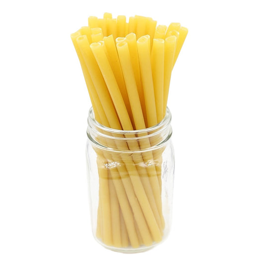 pasta straws in a glass container