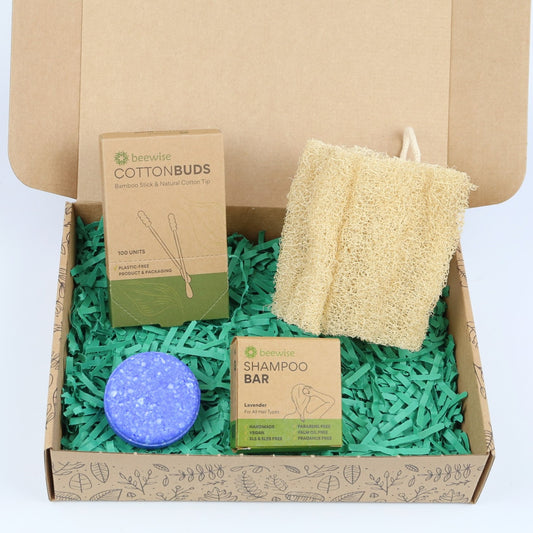 eco gift box with sustainable products with shampoo bar cotton buds and loofah sponge