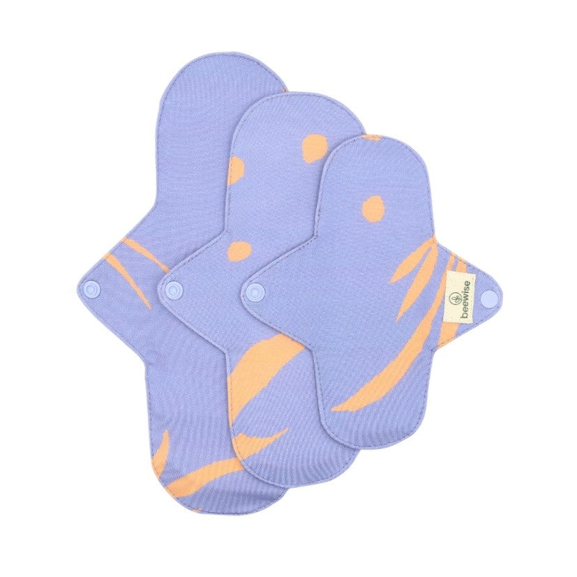 reusable menstrual pads made in brazil with cotton and a blue pattern